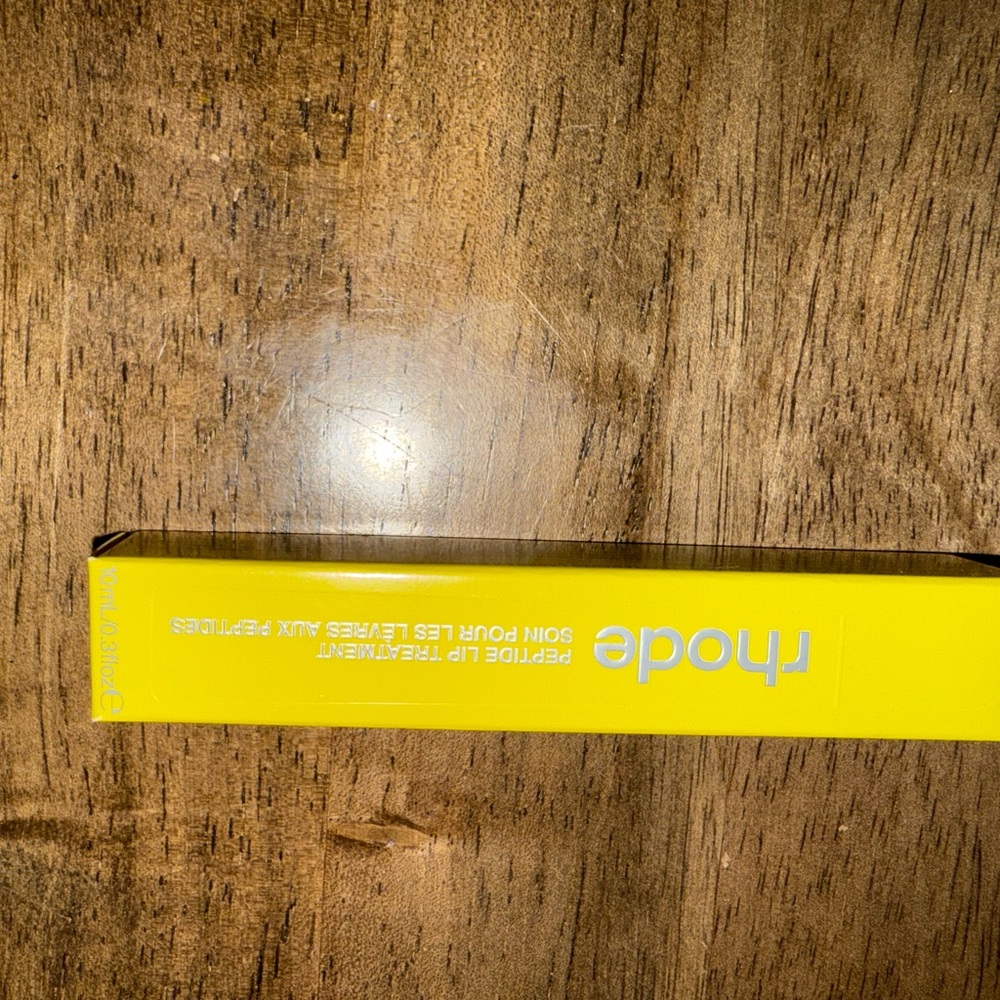 RHODE Lip Treatment in Vibrant Yellow Packaging passionfruit jelly